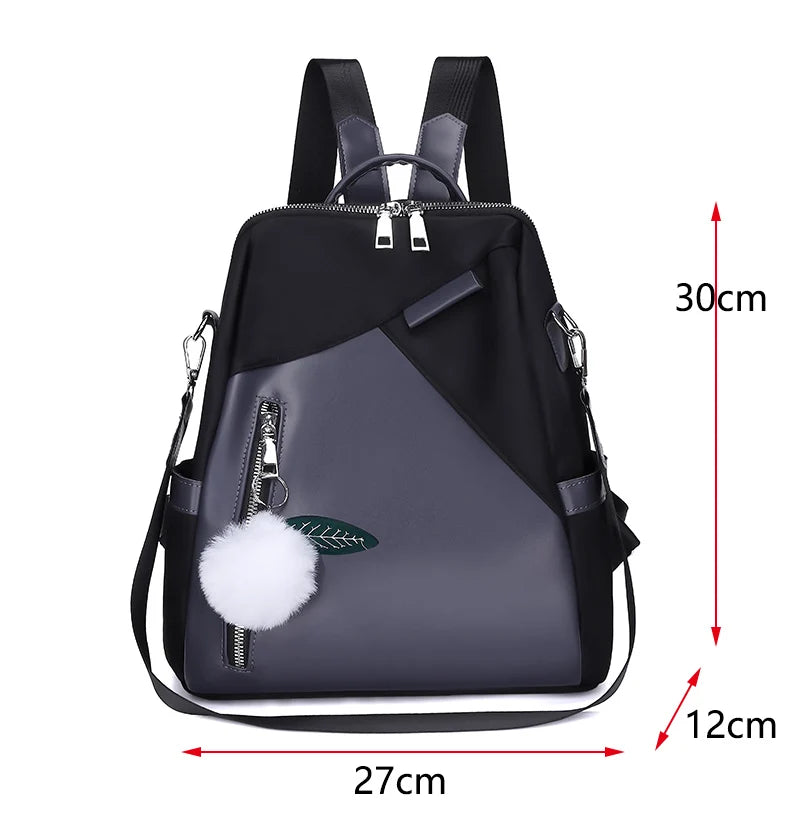 Black and gray backpack with measurements on a white background