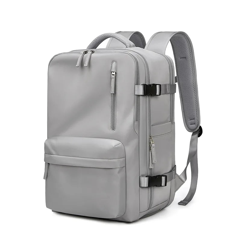 Gray backpack with multiple zippers on a white background