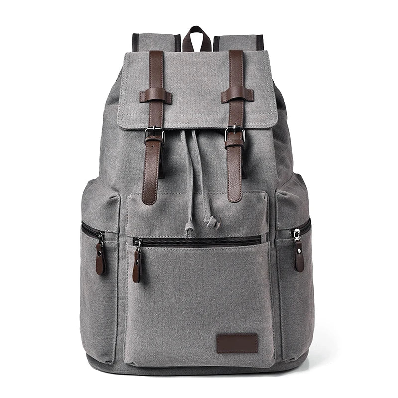 Gray backpack with brown straps and accents on a white background