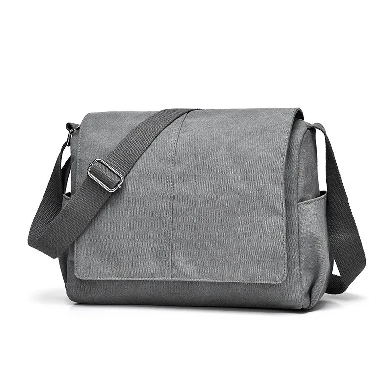 Gray messenger bag with a strap on a white background