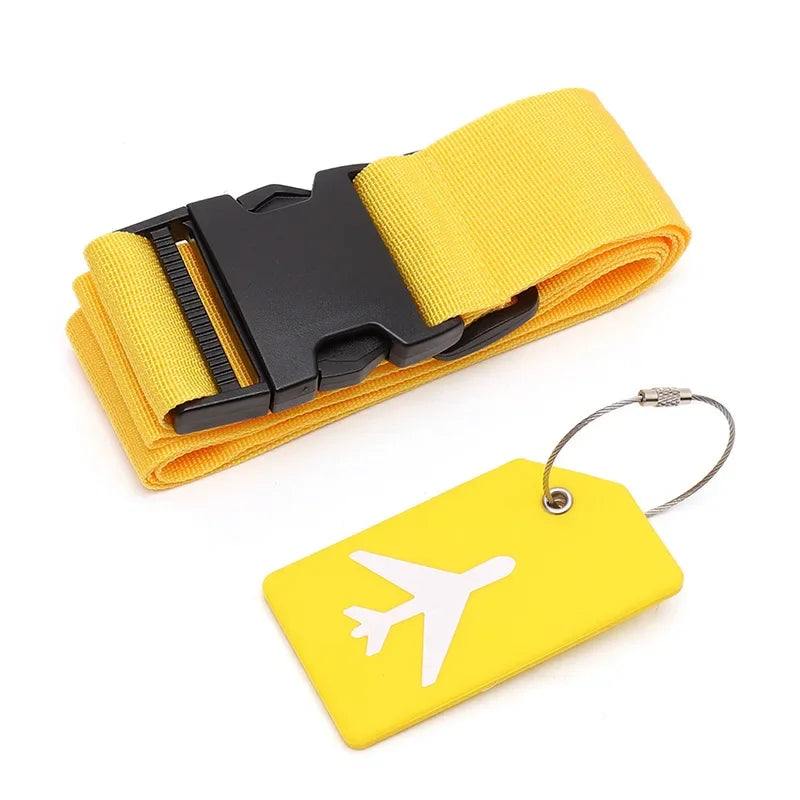 Yellow luggage strap with black buckle and matching luggage tag on a white background