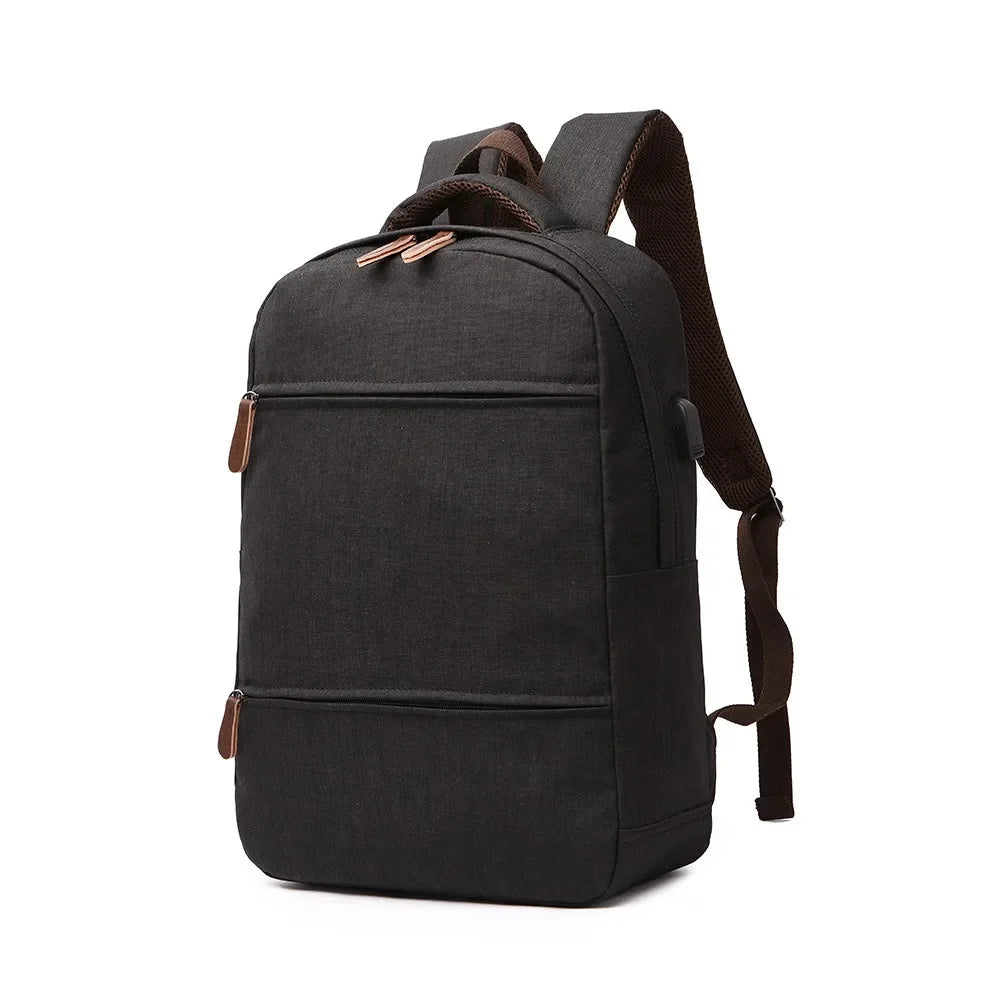 Black backpack with brown accents on a white background