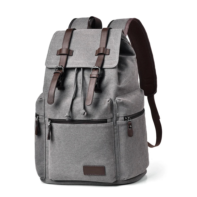 Gray backpack with brown straps on a white background