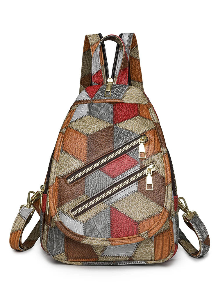 Multicolored patchwork backpack with zippers on a white background