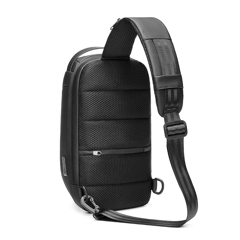 Black sling bag with multiple compartments on a white background