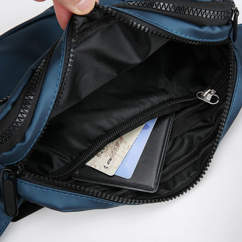 Blue bag with open zipper showing a black wallet and cards on a white background