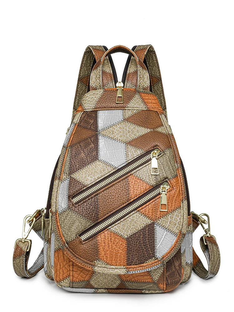 Patchwork patterned backpack with gold zippers on a white background