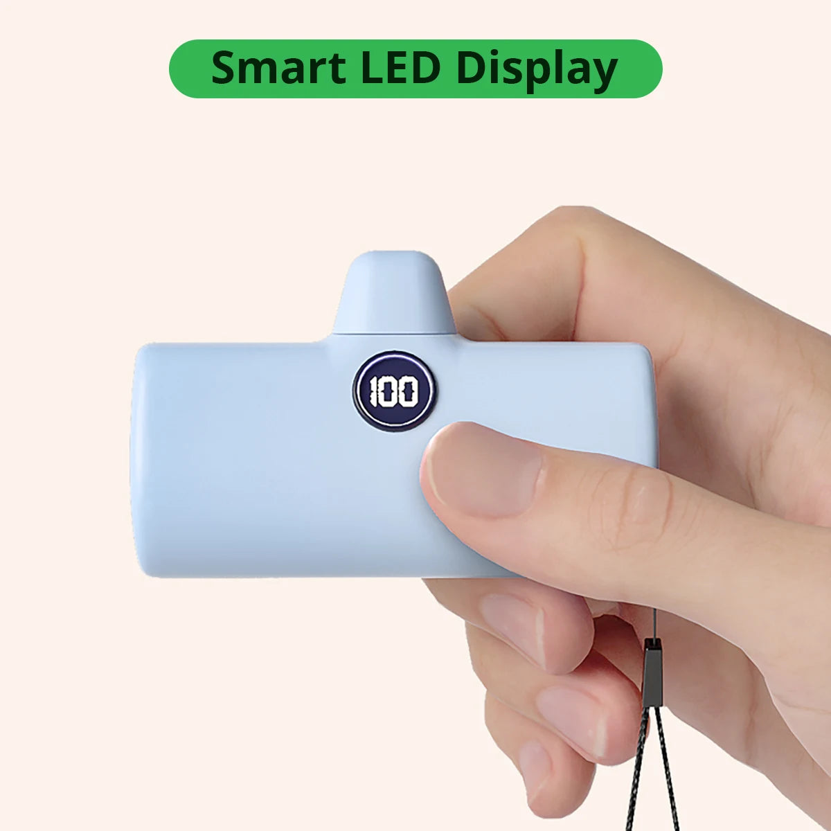 Hand holding a small blue device with a digital display labeled '100' on a white background, featuring text 'Smart LED Display'.