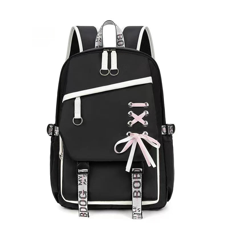 Black backpack with white accents and decorative elements on a white background