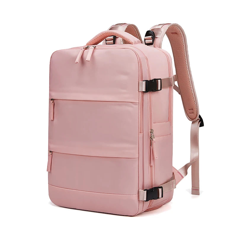 Pink backpack with black straps on a white background