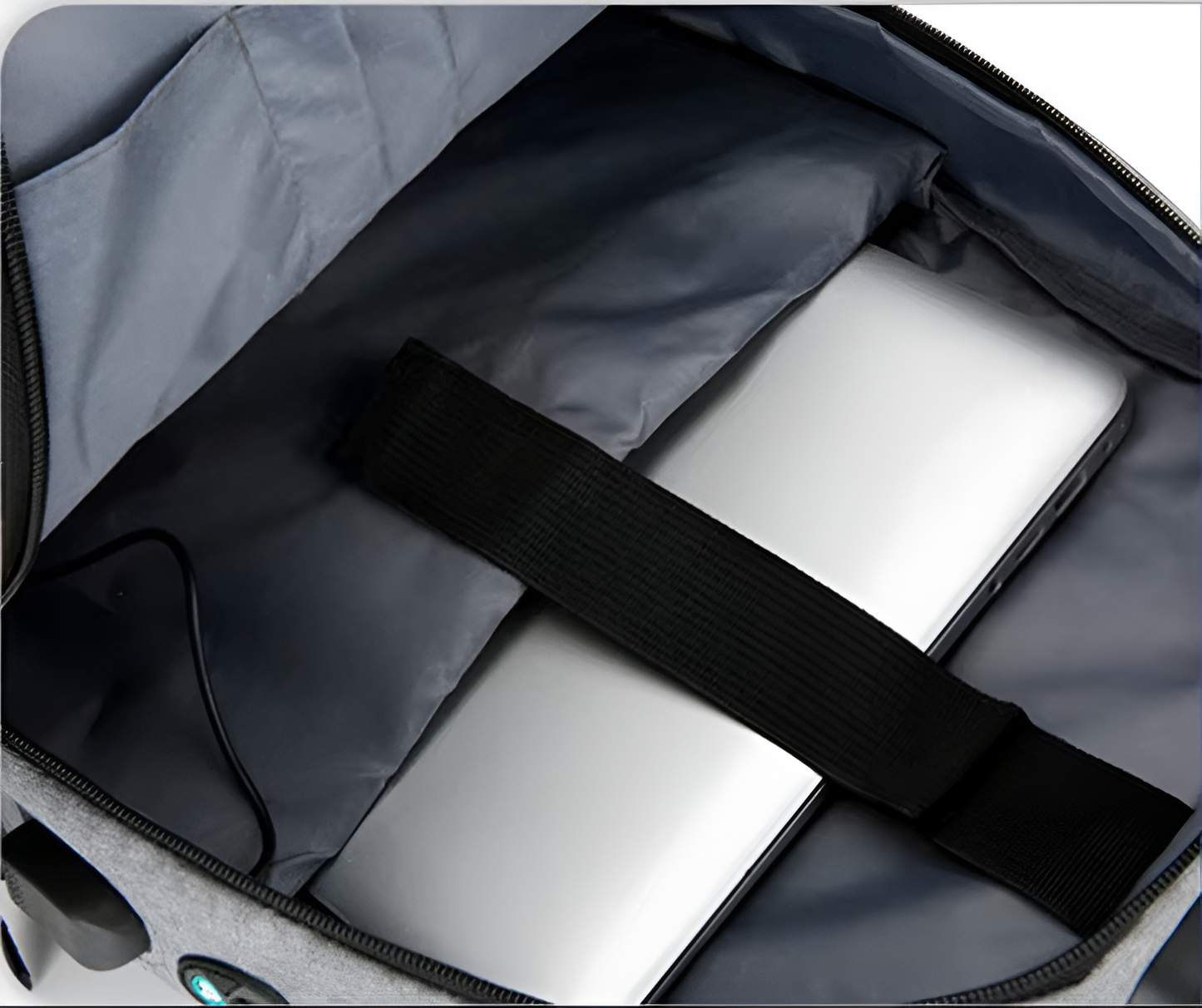 Laptop in a gray bag with a black strap