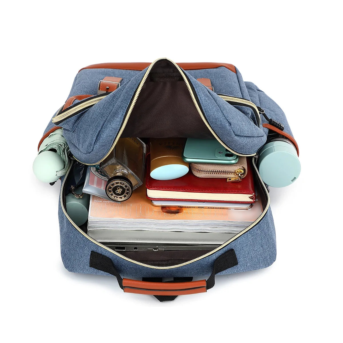 Blue backpack with items like books and a camera inside on a white background