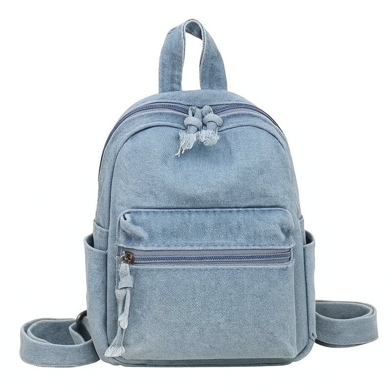 Light blue denim backpack with a strap on a white background