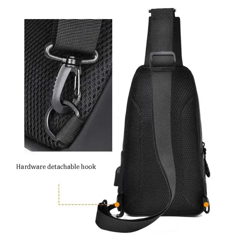 Black sling bag with detachable hook feature on a white background