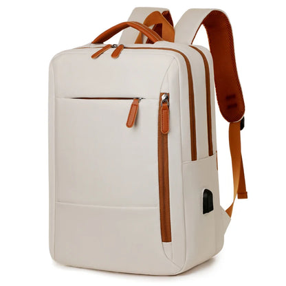 Beige backpack with brown straps on a white background