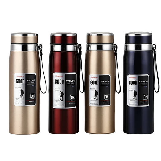 Four vacuum insulated bottles in different colors on a white background
