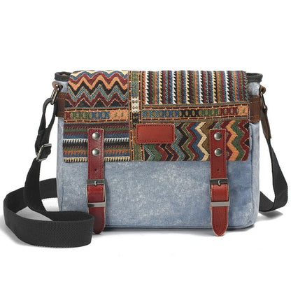 Multicolored patterned bag with denim-like base on a white background
