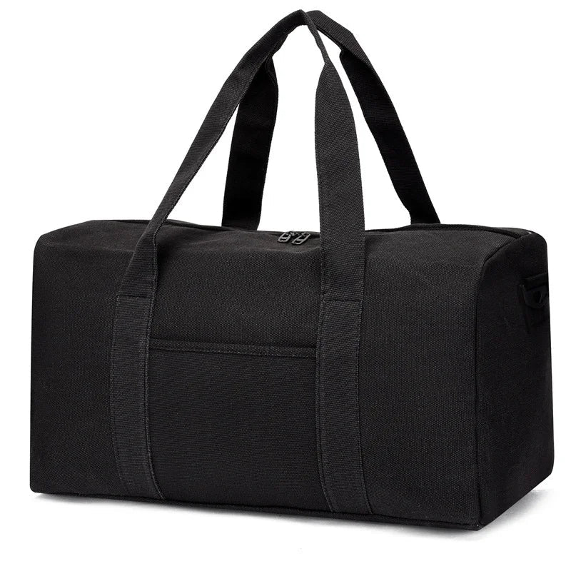 Black duffel bag with straps on a white background