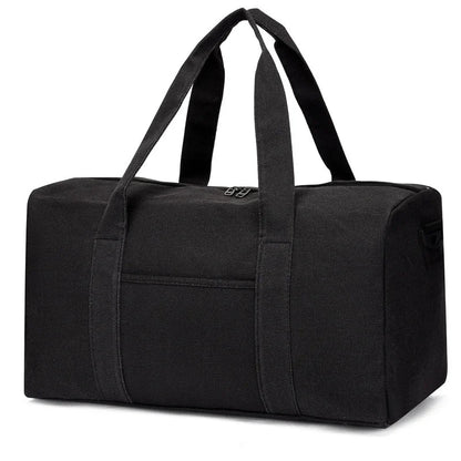 Black duffel bag with straps on a white background