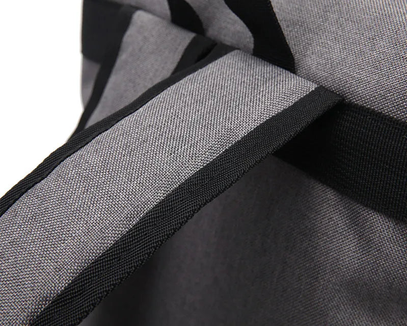 Close-up of a gray and black bag with textured fabric