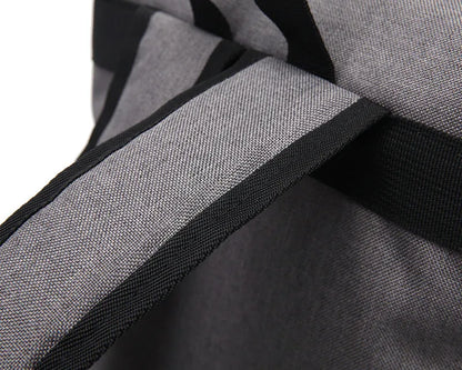 Close-up of a gray and black bag with textured fabric