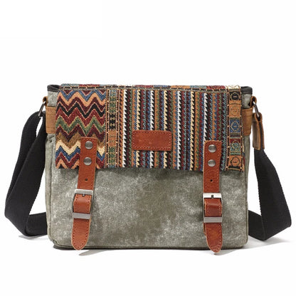 Multicolored patterned bag with brown straps on a white background