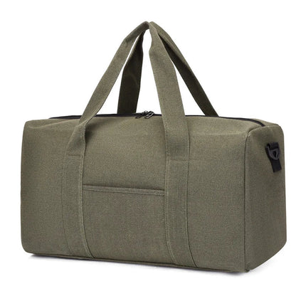 Green duffel bag with handles on a white background