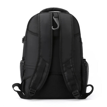 Black backpack shown from the back on a white background