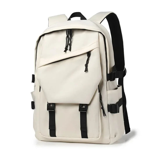 UrbanLite Travel Backpack in beige color, featuring multiple compartments and a sleek, unisex design for daily or travel use.