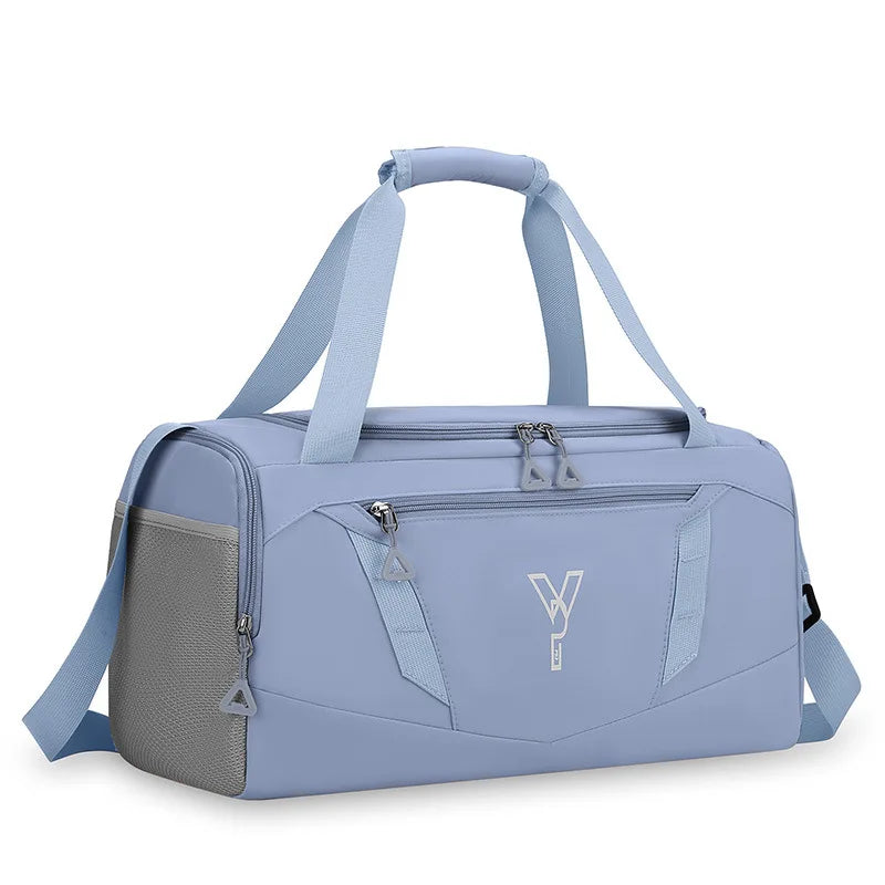 Light blue duffel bag with a visible brand logo on a white background