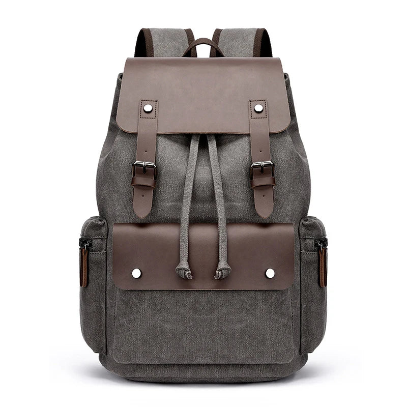 Gray backpack with brown leather accents on a white background