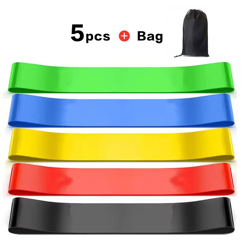 Set of five resistance bands in green, blue, yellow, red, and black with a carrying bag on a white background.