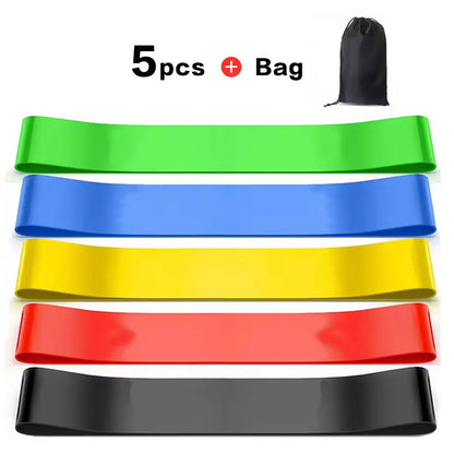 Set of five resistance bands in green, blue, yellow, red, and black with a carrying bag on a white background.