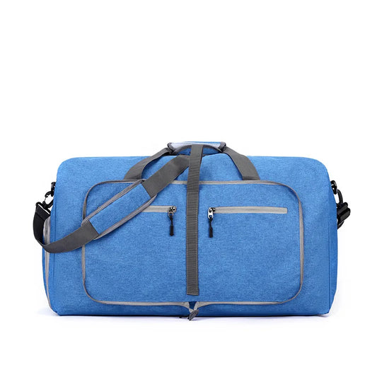 Blue duffel bag with gray straps on a white background