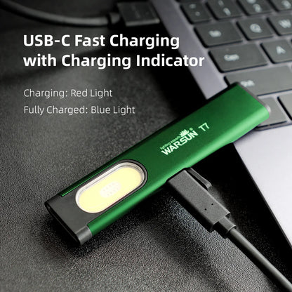 Green USB-C charging cable with indicator lights on a laptop keyboard