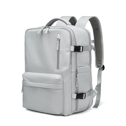 Light gray backpack with multiple zippers on a white background