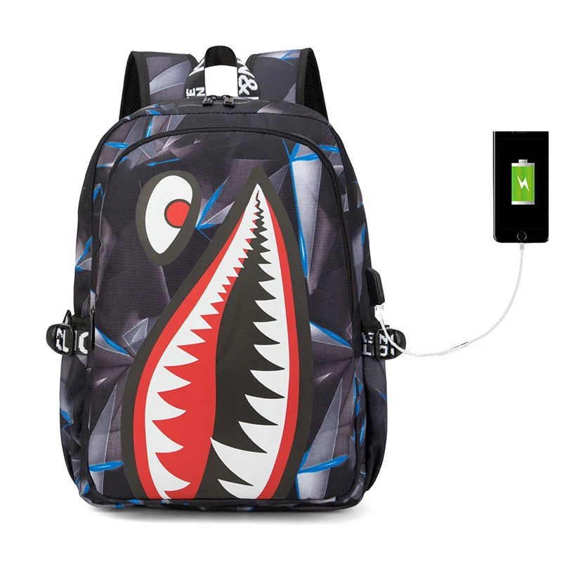 Backpack with shark design and USB port on a white background