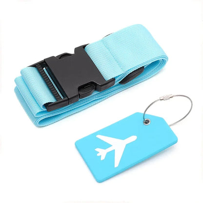 Light blue luggage strap with black buckle and matching luggage tag on a white background