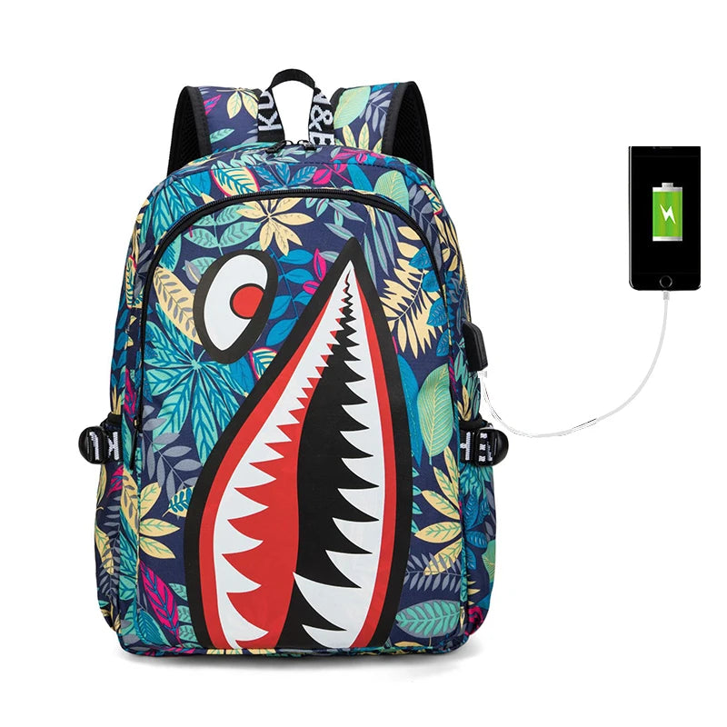 Colorful backpack with shark mouth design on a white background