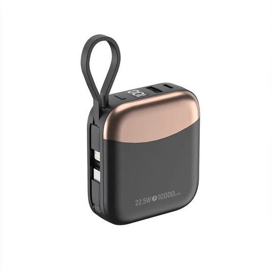 Black and rose gold power bank with USB ports on a white background