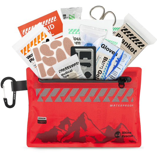 Red emergency kit with mountain design on a white background