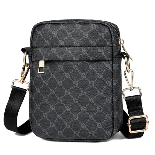 Black patterned crossbody bag with gold accents on a white background