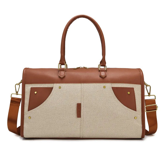 Brown and beige handbag with gold accents on a white background