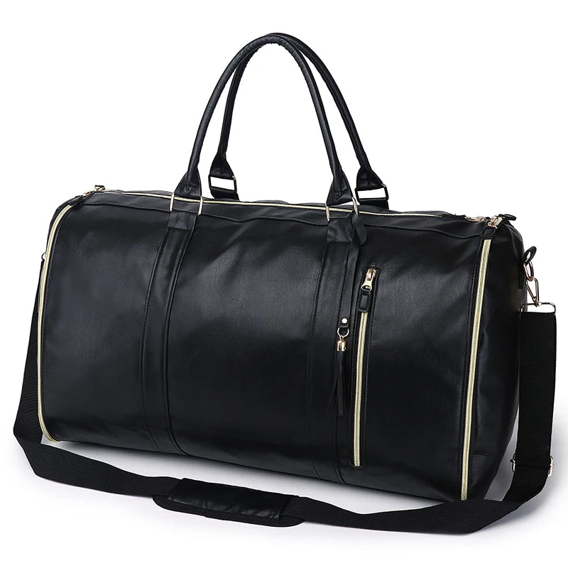Black duffel bag with gold zipper details on a white background