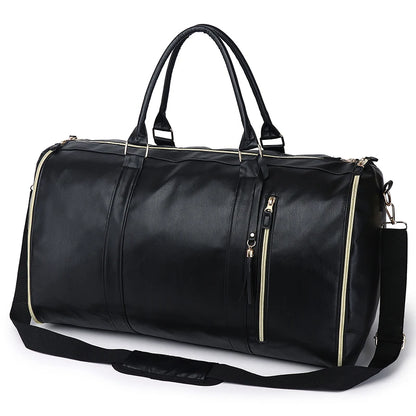 Black duffel bag with gold zipper details on a white background