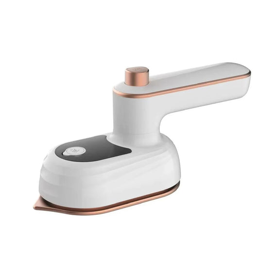 White and rose gold iron on a white background