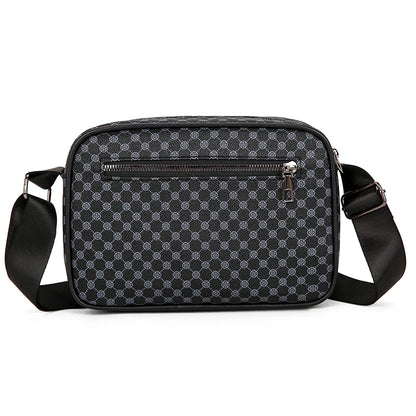 Black patterned shoulder bag on a white background