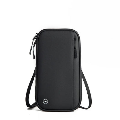 Black travel pouch with a strap on a white background