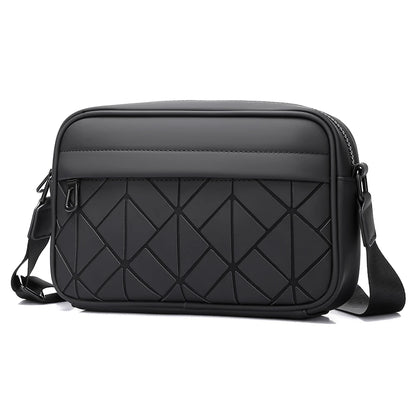 Black quilted crossbody bag on a white background