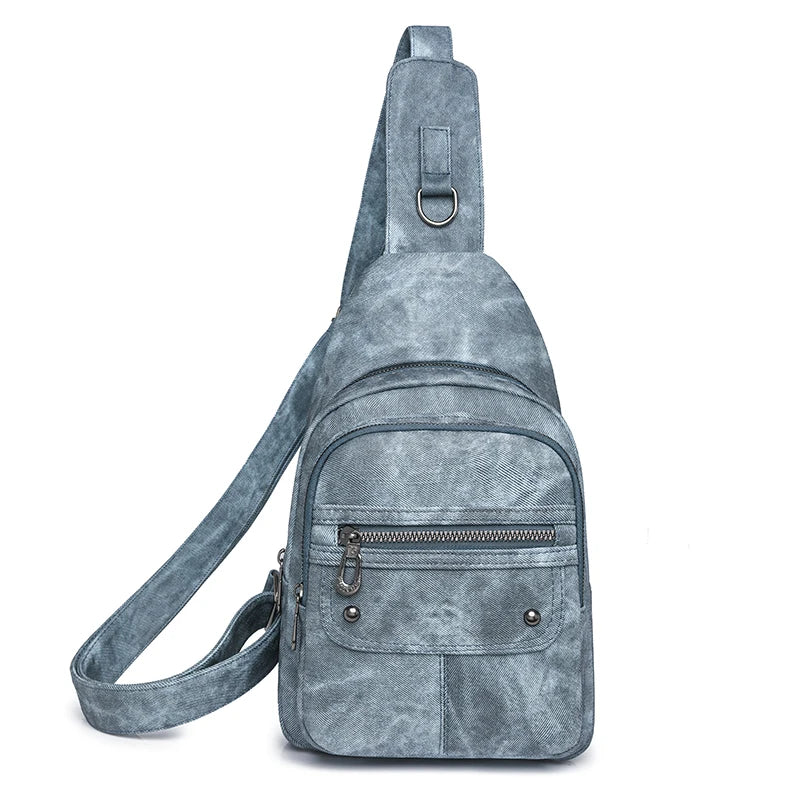 Gray suede sling bag on a white background